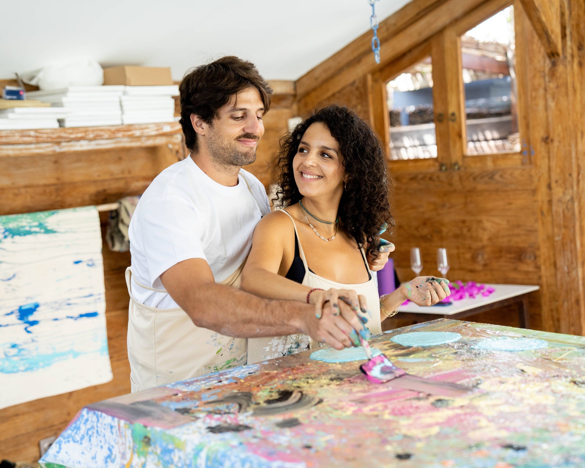 A couple painting together during a workshop at BKCH